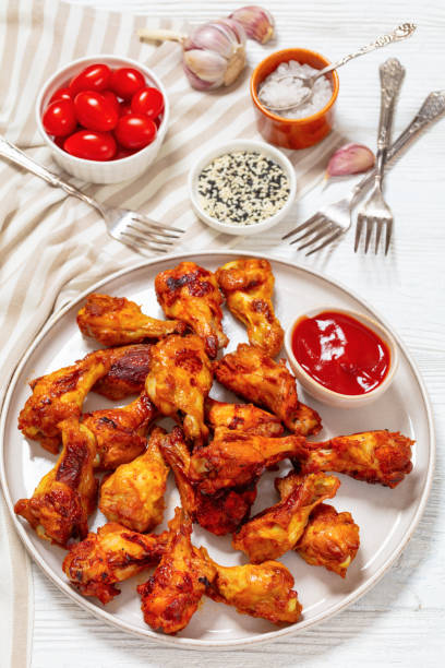 istock spicy crispy grilled chicken wings, top view 2009664846