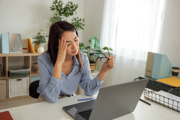 istock Frustrated woman having video call at home office 2009670827