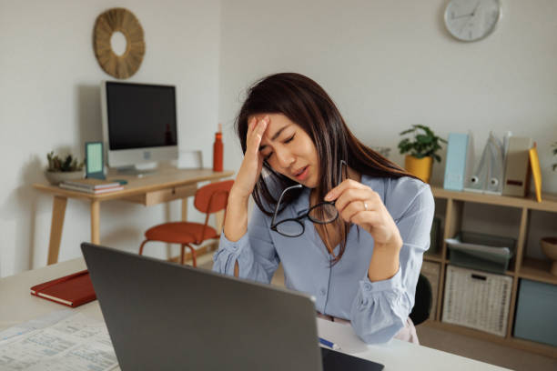istock Frustrated woman having video call at home office 2009671380