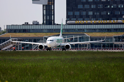 Schiphol, The Netherlands - June 22, 2014: KLM Royal Dutch Airlines Boeing 737 landing at Schiphol airport near Amsterdam in The Netherlands. KLM - Koninklijke Luchtvaart Maatschappij N.V. (Royal Dutch Airlines), is the flag carrier airline of the Netherlands.