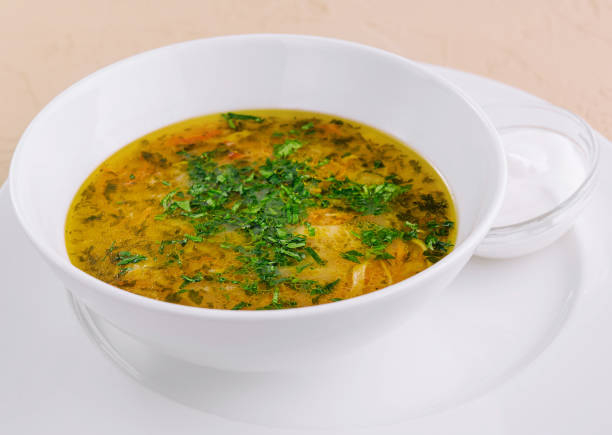 istock parsley noodle soup on white bowl 2009671945