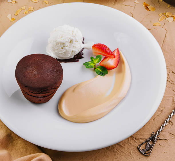 istock lava cake with ice cream on white plate 2009671953