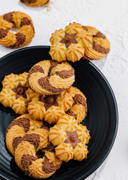 istock crumbly cookies with chocolate on black plate 2009673574