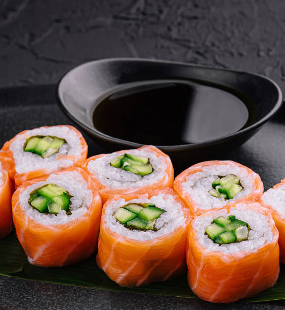 istock Philadelphia salmon sushi with cucumber inside on plate 2009674847