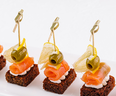 canapes with cheese and red fish
