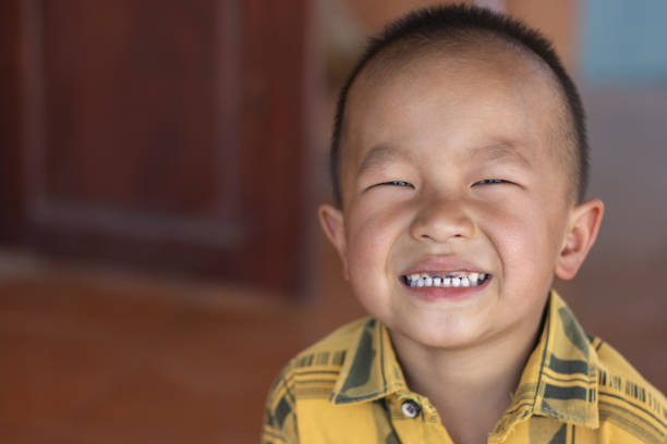 istock closeup happy broken tooth laugh showing losing tooth 2009683685