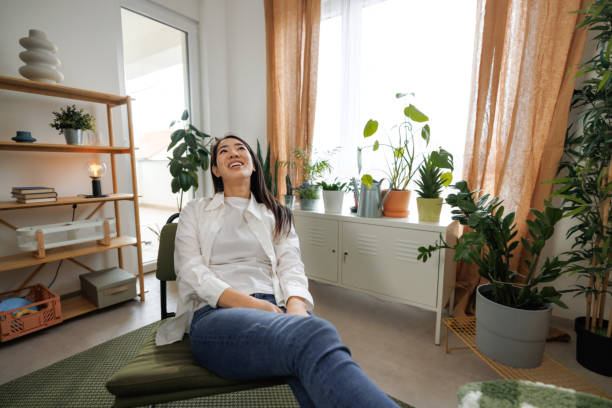 istock Young beautiful woman relaxing at home 2009684917