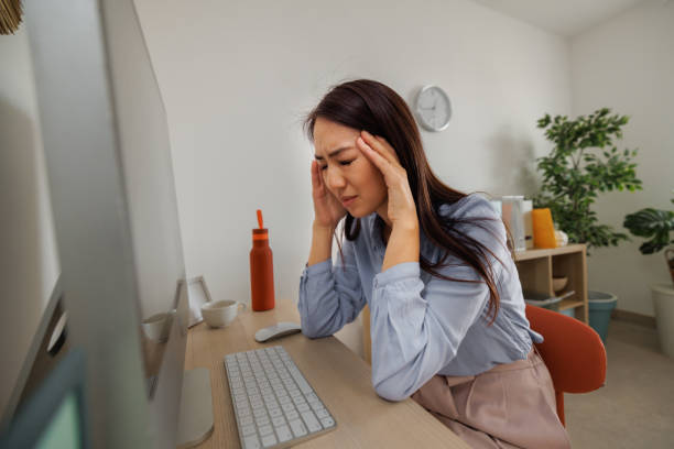 istock Stressed woman working at home office 2009686730