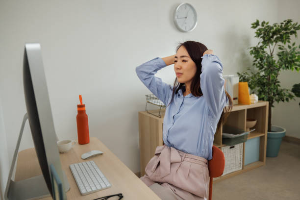 istock Stressed woman working at home office 2009686809