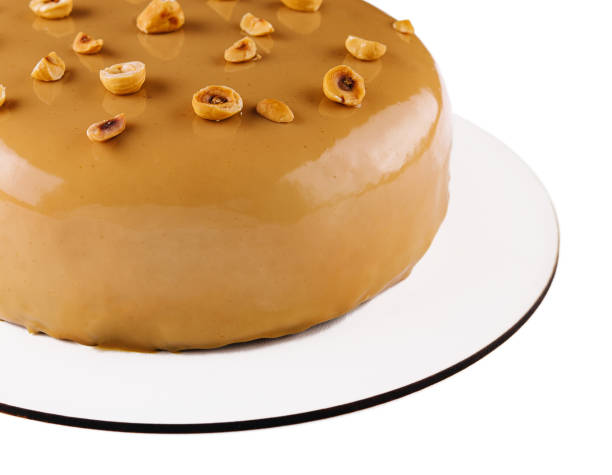 istock Sweet caramel cake with hazelnut and moouse 2009687786