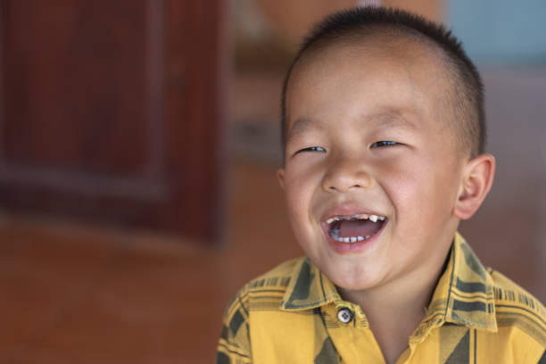 istock closeup happy broken tooth laugh showing losing tooth 2009688057