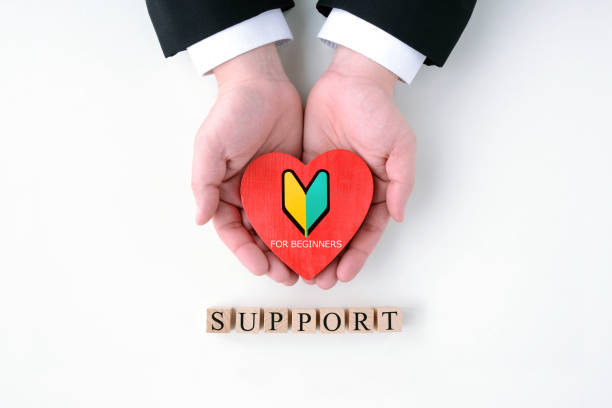 istock Business man’s hands and heart object with Japanese beginner’s sign 2009692407