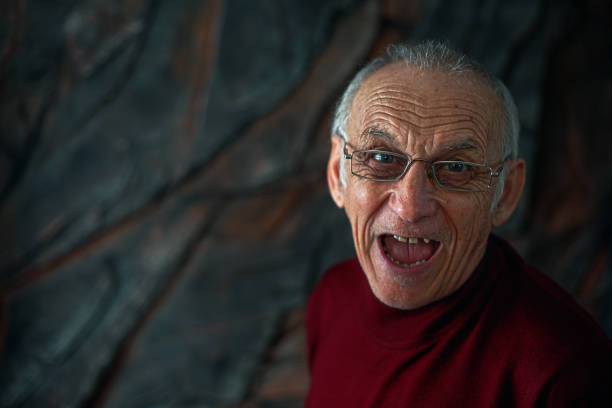 Close-up of a man screaming joyfully