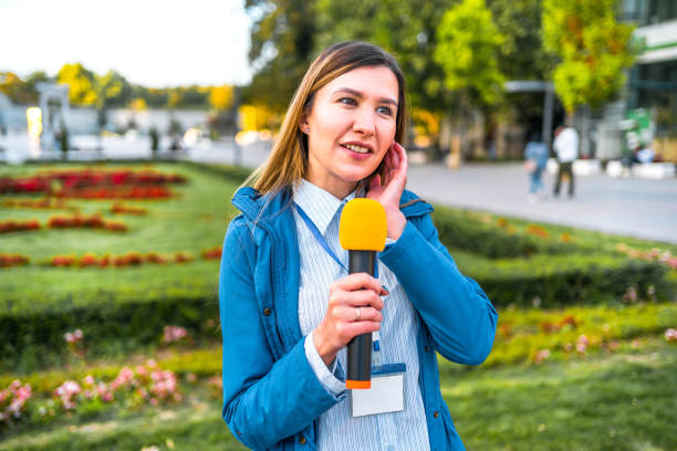 istock Female news reporter in live broadcasting 2009762240