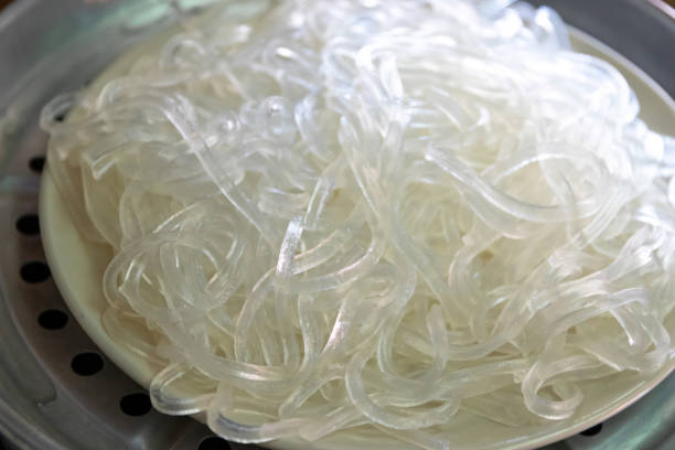 Kuzukiri vermicelli is made from potato starch on dish.