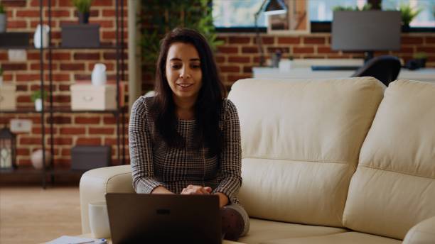istock Woman chatting with mates in videocall using laptop 2009828993