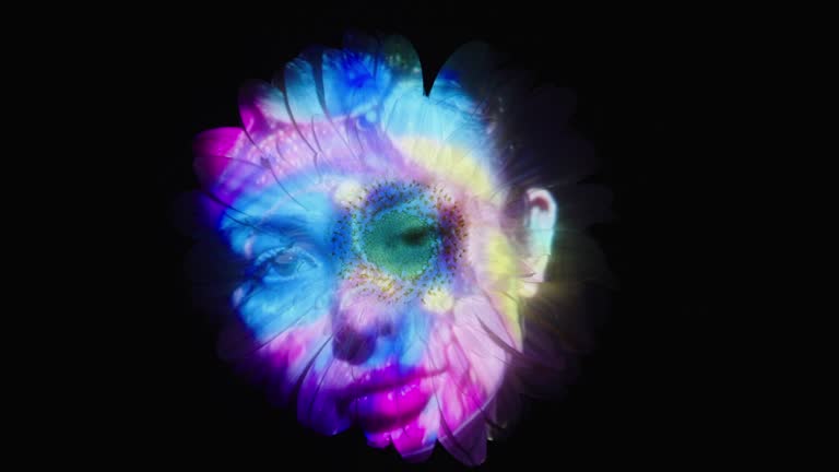 Woman's face projection on a flower