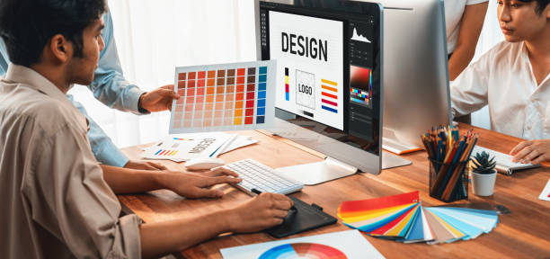 istock Graphic designer works on computer laptop with digital pen. Scrutinize 2009859122