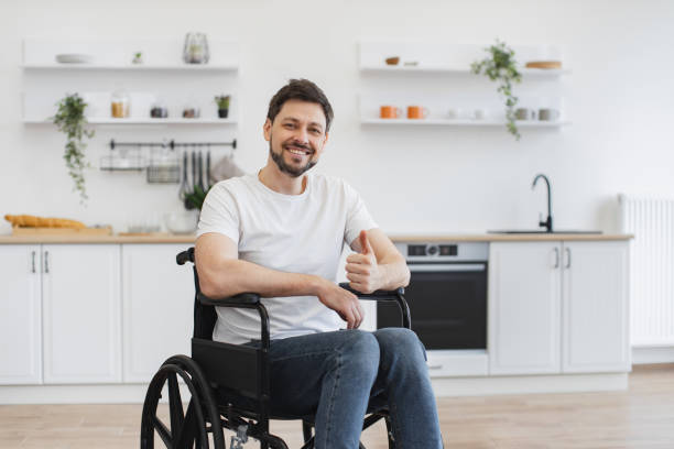 istock Adult with disability posing in dining room at home 2009863974