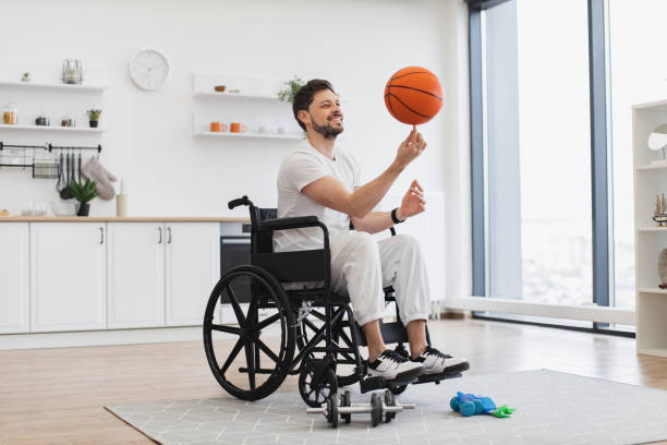 istock Caucasian in white sportswear staying active with disability while playing game. 2009910569