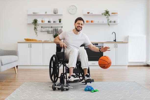 istock Caucasian in white sportswear staying active with disability while playing game. 2009910578