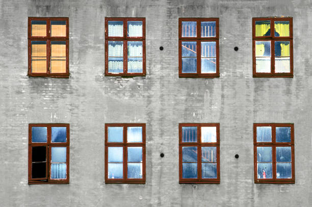 pattern of windows in geometric structure at an old house wall in Copenhagen, Denmark