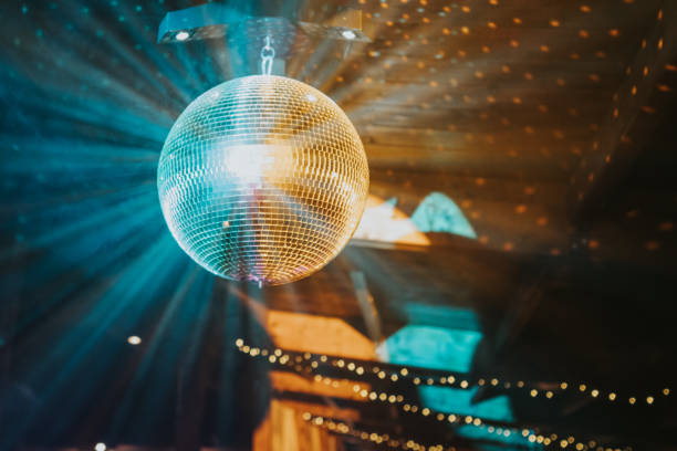 A mirror ball or disco ball or simply disco ball.