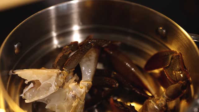 Crab Legs Cooking in a Pot