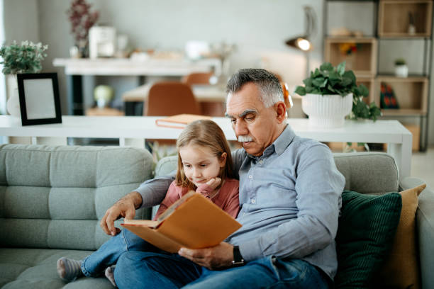 istock Grandfather tells a fairy tale 2010014009
