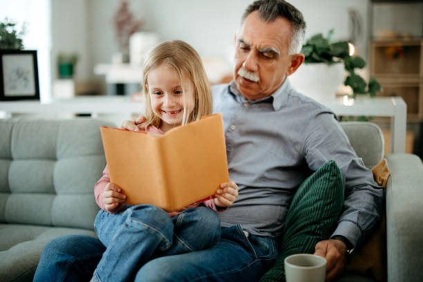 istock Grandfather tells a fairy tale 2010015064