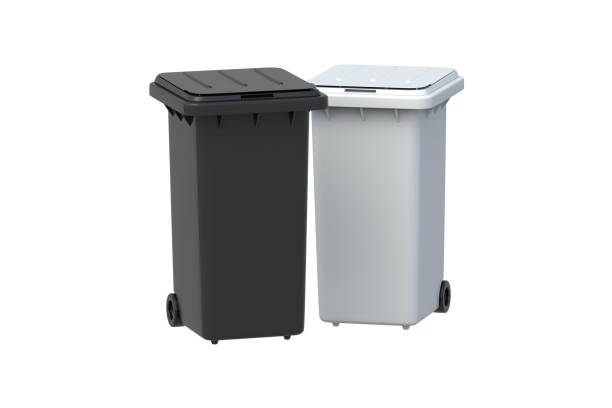 istock Two recycling bins isolated on white background. Garbage cans. Waste collection. Trash containers. 3d render 2010020405