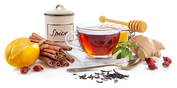 Cup tea with ginger spice and mint. Still life hot drink cinnamon Rose Hip. Isolated on white background.