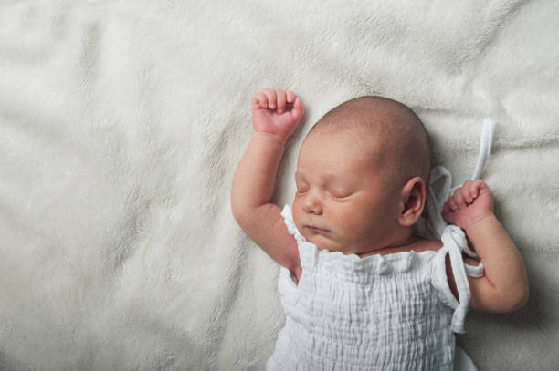 istock Newborn sleeping close up. Baby care concept.. 2010130118