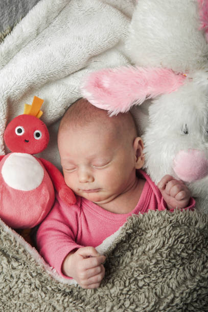 Newborn sleeping close up. Baby care concept.