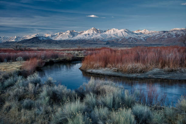 istock Scenic landscape view across a river with distant mountains in Eastern Sierras, California. 2010137190