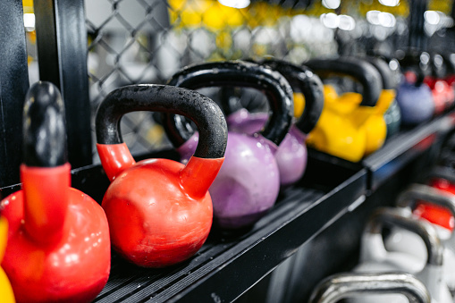 Close-up of different sized kettlebells at the gym in Kuwait City.