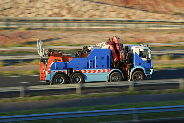 Roadside rescue crane for trucks traveling on a highway in Spain