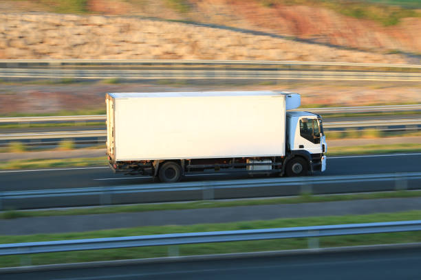istock Refrigerated truck with billboard at sunset 2010183361