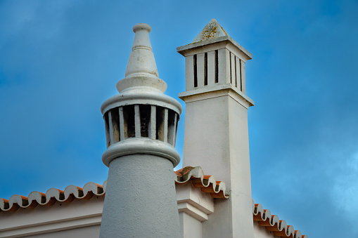 The unique Algarvian chimneys (ChaminÃ© Algarvia dorning cities and villages across Portugal's Algarve region