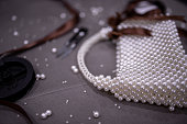Handmade elegant pearl bag with brown bow