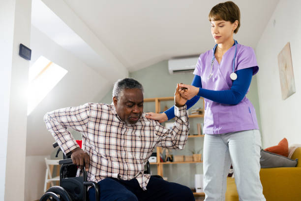 istock Young caregiver assisting a senior patient 2010195836