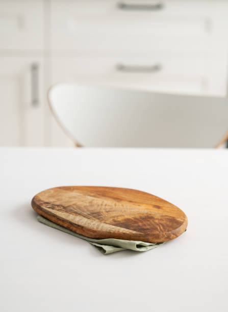istock Wooden tabletop with cutting board for product montage or mockup 2010230619