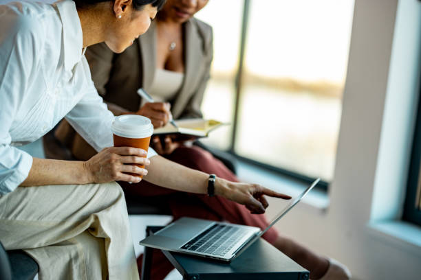 istock Diversity, women for consulting by technology, performance review and concern with job progress 2010236900