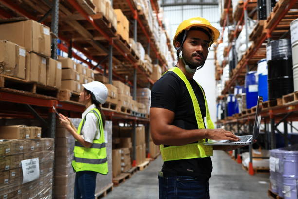 istock Female warehouse supervisor and male operator are working in high rack warehouses, warehouse logistic concepts, and distribution warehouses with high shelves and loaders. 2010262243