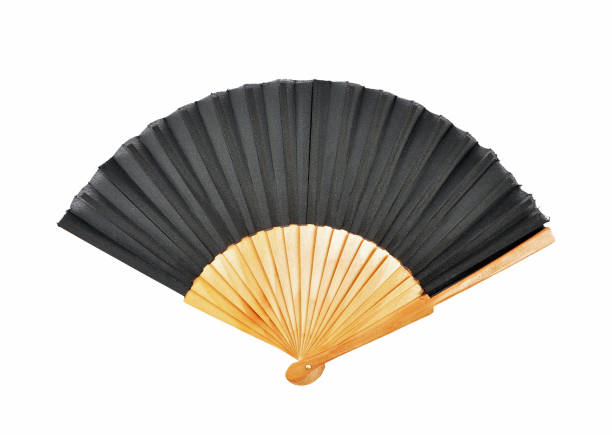 istock Hand held fan out of bamboo on a white background 2010272265