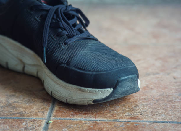 istock single left black shoe, black shoe with no pair 2010273354