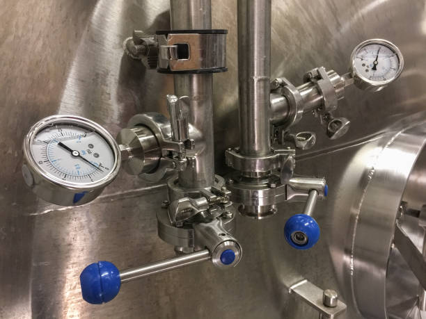 istock Valve and gauges of fermentation tank in brewery 2010299063