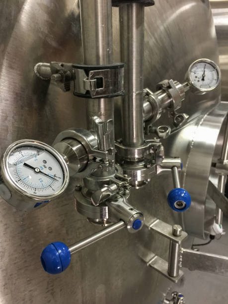 istock Valve and gauges of fermentation tank in brewery 2010299065