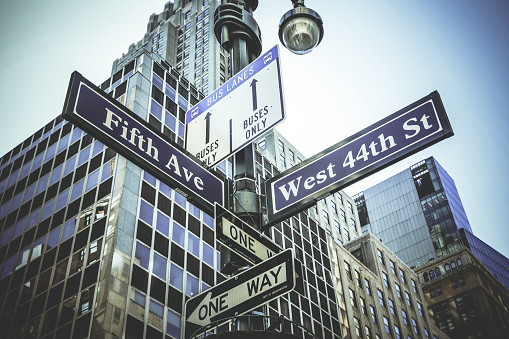 Broadway directional street signpost in New York