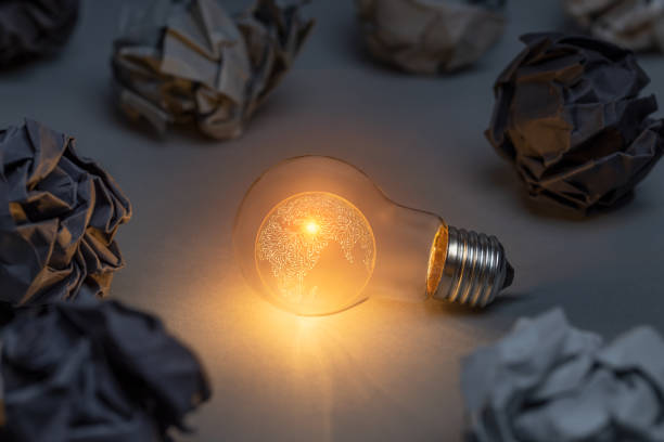 istock Artificial intelligence planet earth concept with classic light bulb glowing in the dark 2010306213
